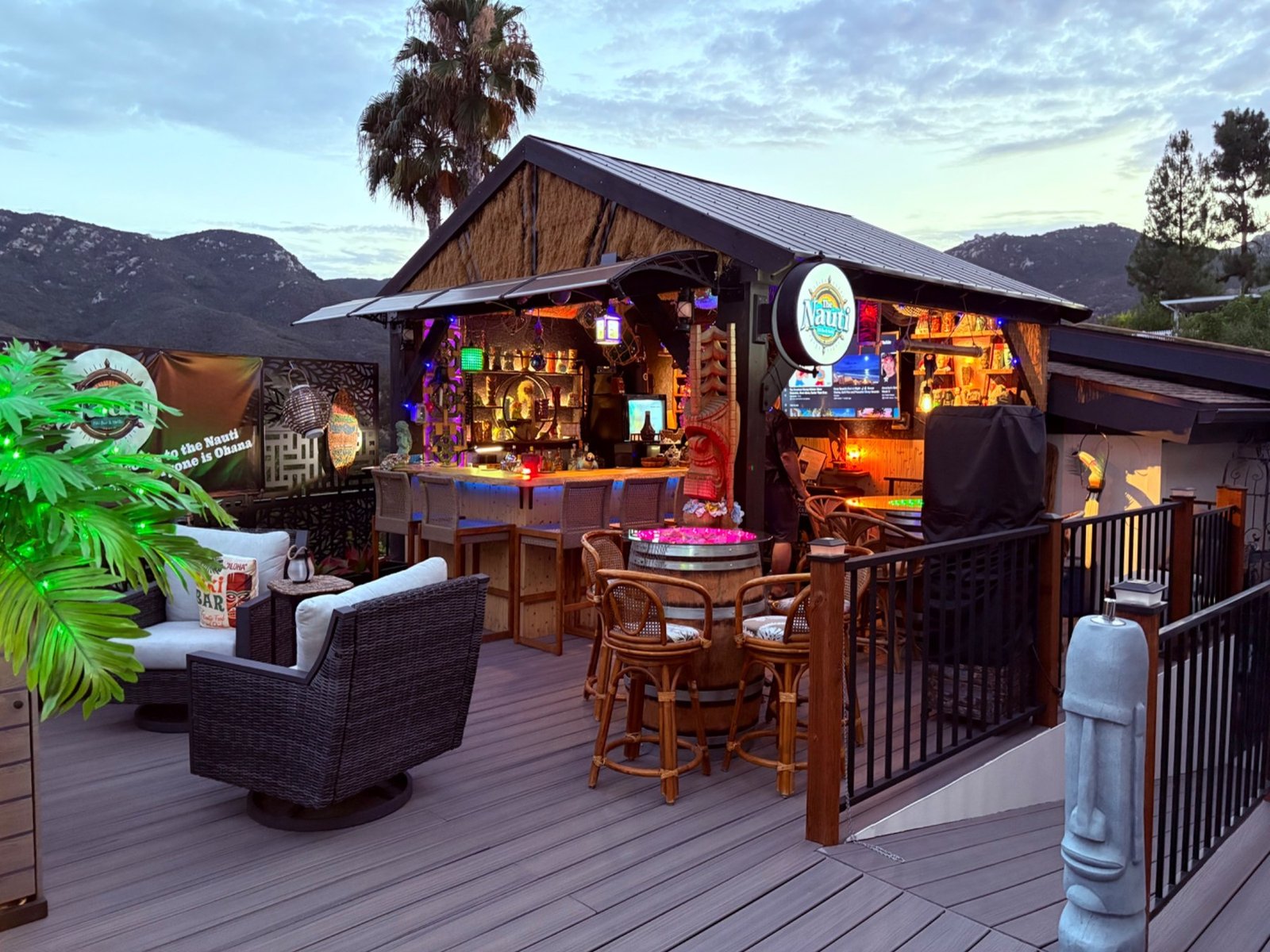 The Nauti Tiki glowing at dusk