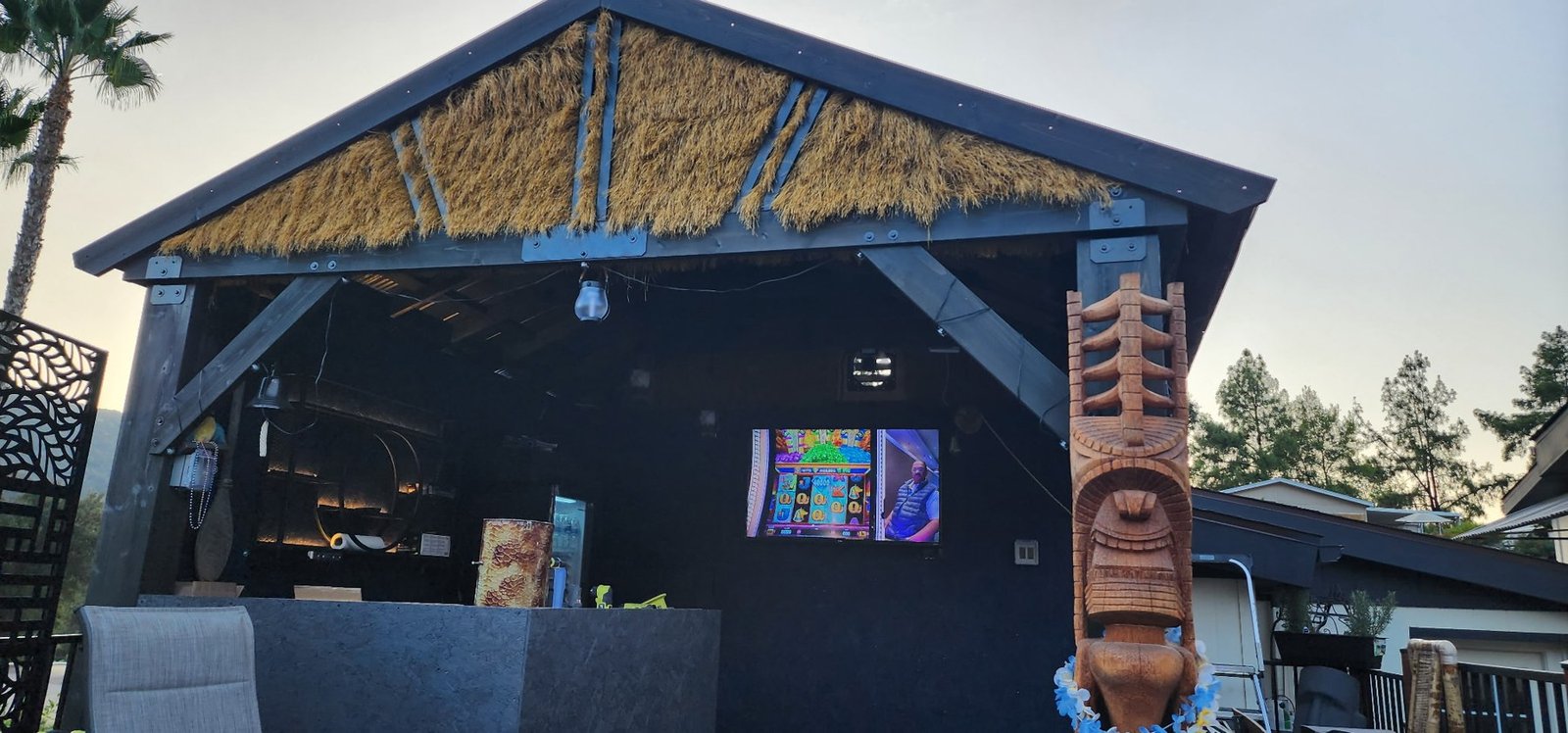 Tiki carvings at the entrance